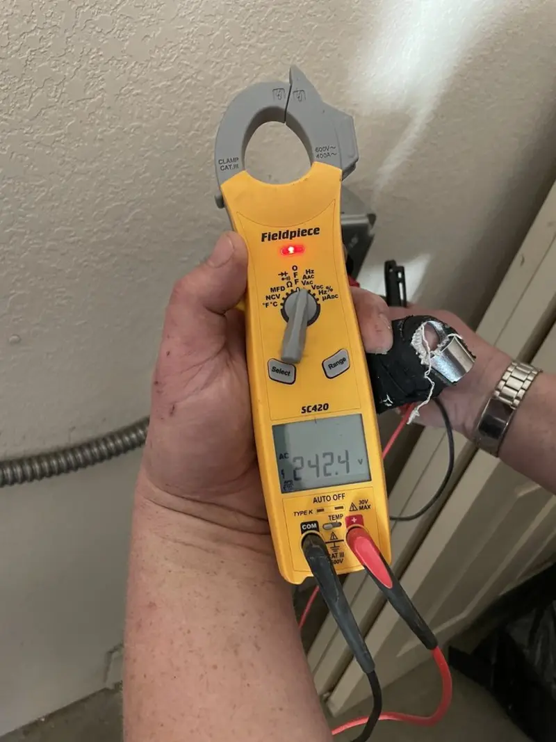 Voltage testing with clamp meter during Circuit Breaker Repair in Seminole